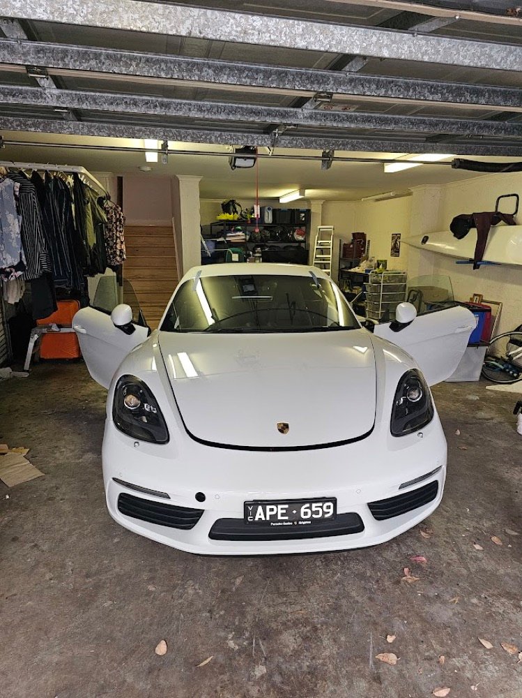 Porsche windscreen replacement in a home garage, Melbourne south-east